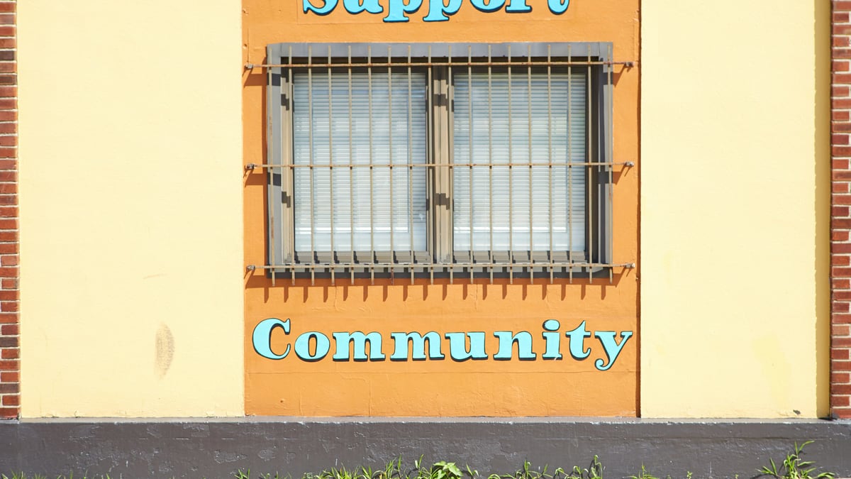 brown steel window frame with text overlay